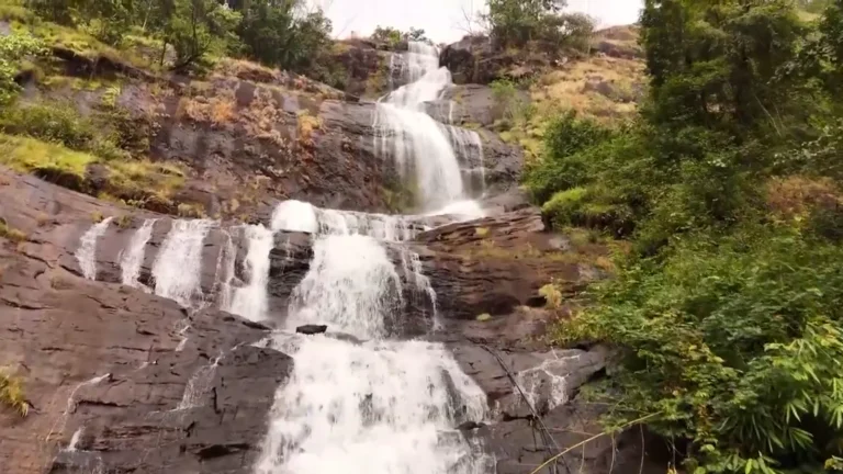 Waterfall cascading over rocks near Munnar, Kerala, India
