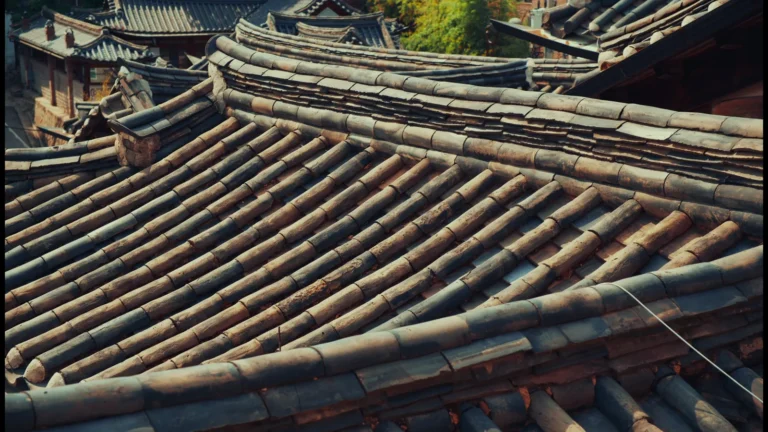 Curved tiled rooftops of a traditional building in Seoul, South Korea