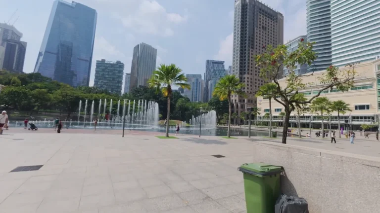 Open plaza surrounded by skyscrapers in Kuala Lumpur, Malaysia