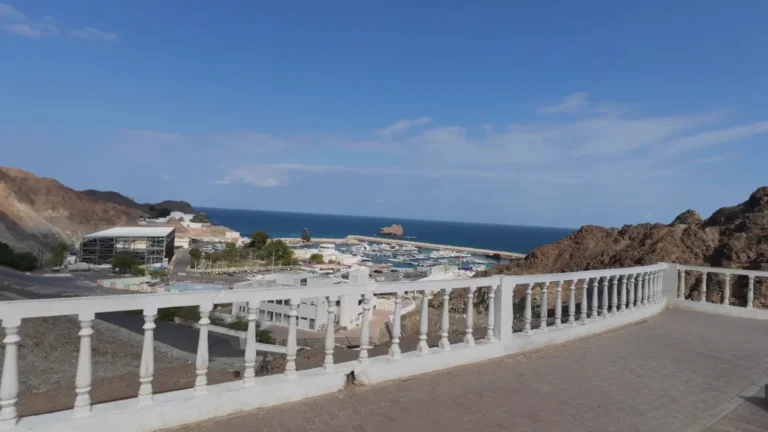 Harbour and bay below rocky hills in Oman