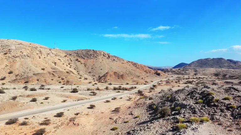 Desert valley and rocky hills in Oman