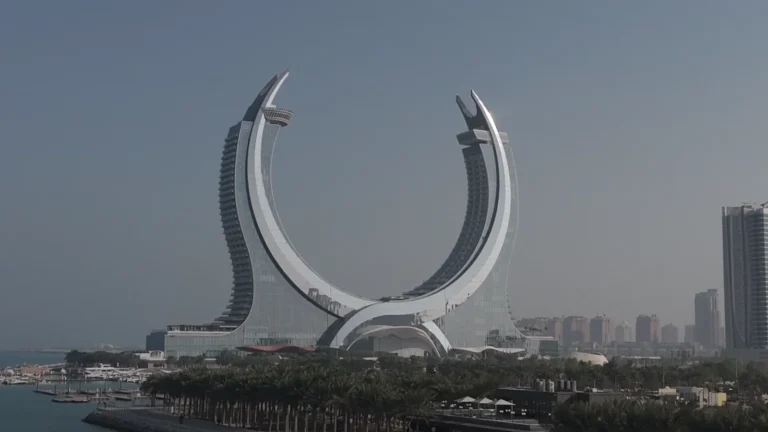 Modern crescent-shaped towers on the coast of Qatar