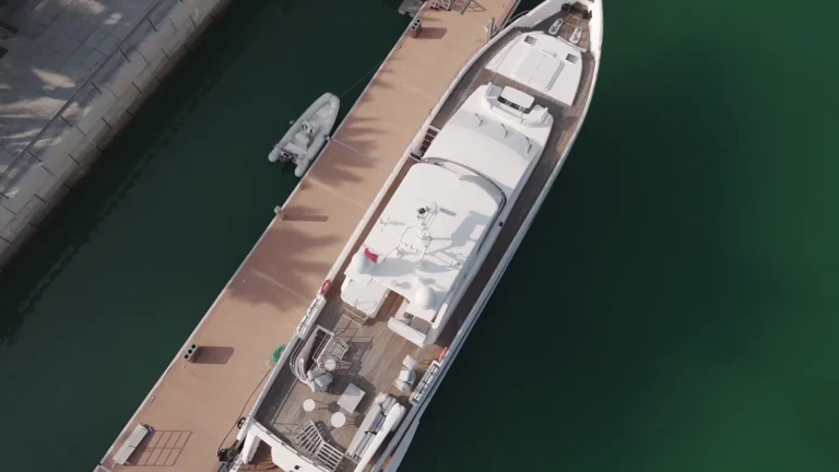 Aerial view of a yacht moored at a marina in Qatar