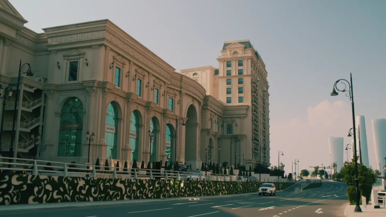 Ornate building facades along a street in Qatar