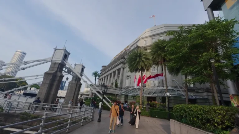 Historic building and bridge by the river in Singapore