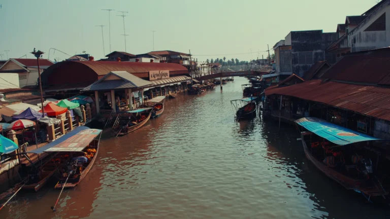 Canal lined with waterside houses in Thailand
