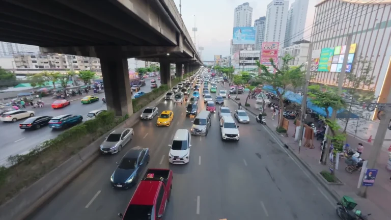 Busy road beneath an elevated highway in Thailand