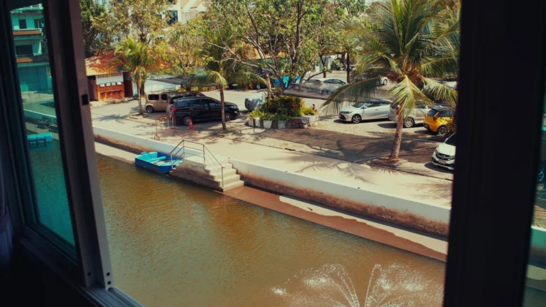 Riverside walkway and trees in Thailand