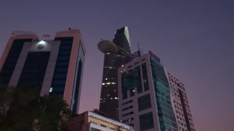 Glass office towers at dusk in Vietnam