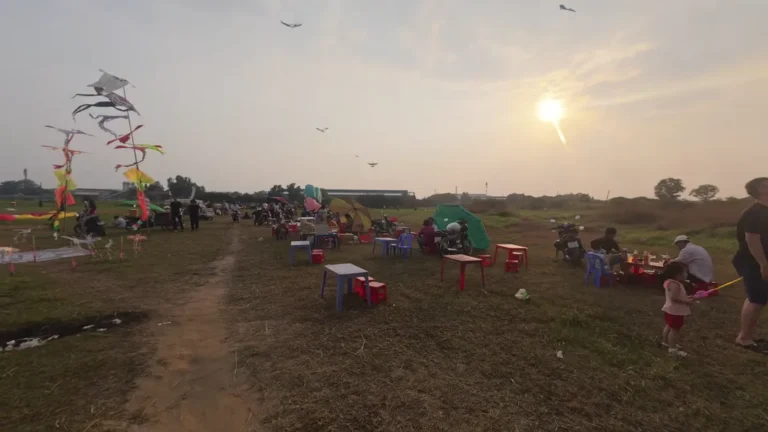 Open ground with kites at sunset in Vietnam